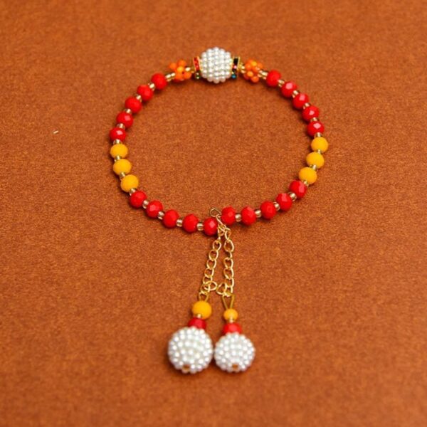 Red and Yellow Pearl Bracelet Rakhi For Women