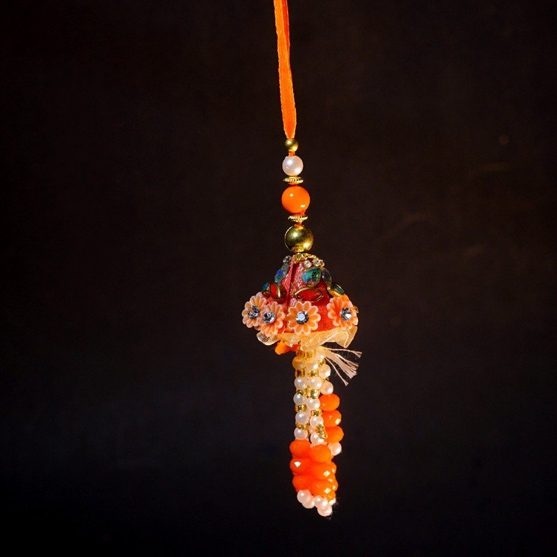 Orange Rakhi for Bhabhi With White beads