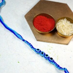 Evil Eye Charm Thread Rakhi In Blue (12 pcs)