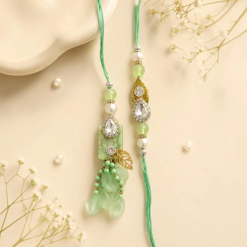 Mint Green Crystal Bhaiya-Bhabhi Rakhi-Lumba Combo With Leaf Tassels 2 Crystal Bhaiya-Bhabhi Rakhi-Lumba Combo