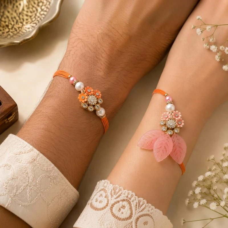 Orange Floral Bhaiya-Bhabhi Rakhi & Leaf Lumba Combo 3 Floral Bhaiya-Bhabhi Rakhi & Leaf Lumba
