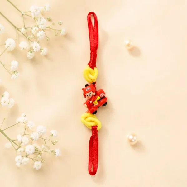 Red Scooter Rider Kids Rakhi with Yellow Links