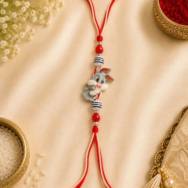 Cute Bunny Cartoon Rakhi for Kids with Red Beads