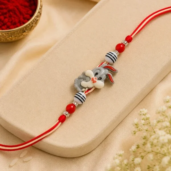 Cute Bunny Cartoon Rakhi for Kids with Red Beads