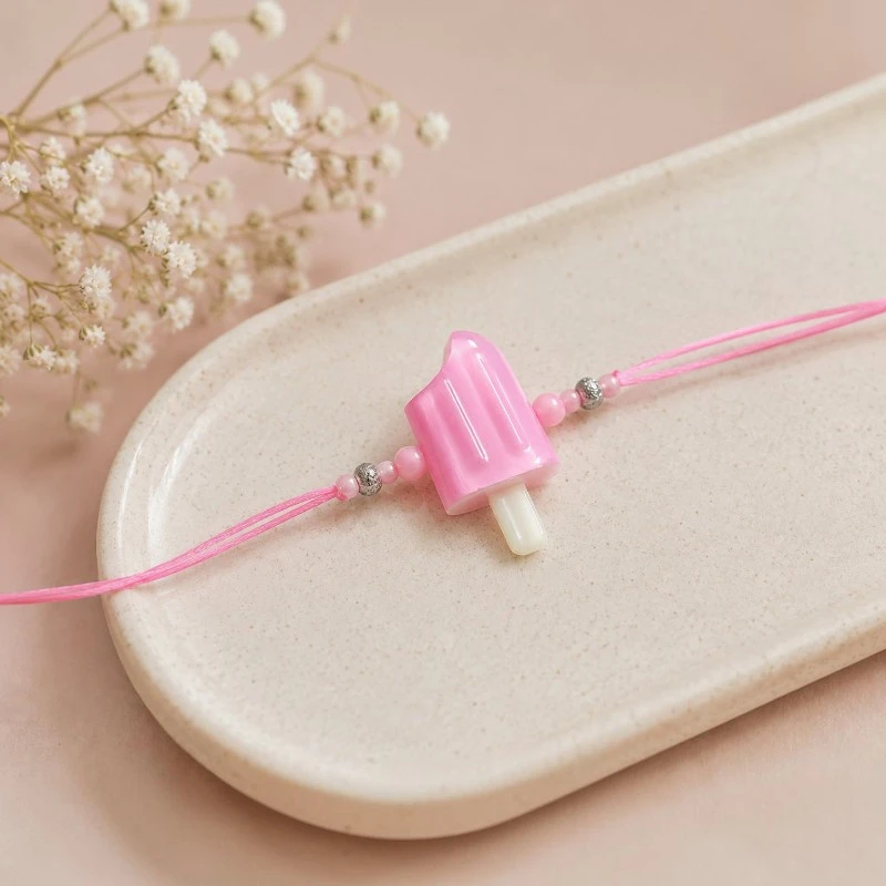 Pink Popsicle Beaded Rakhi for Kids With Soft Thread 1 Pink Popsicle Beaded Rakhi for Kids