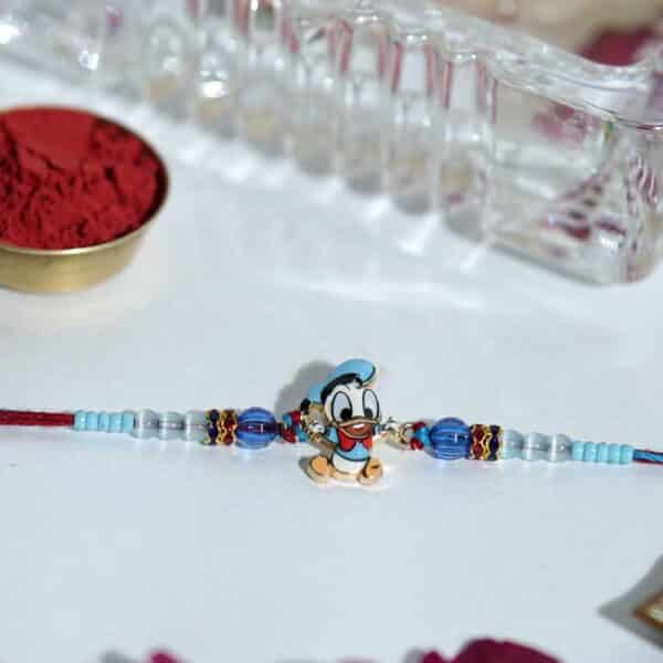 Donald Duck Cartoon Rakhi for Kids with Blue Beads