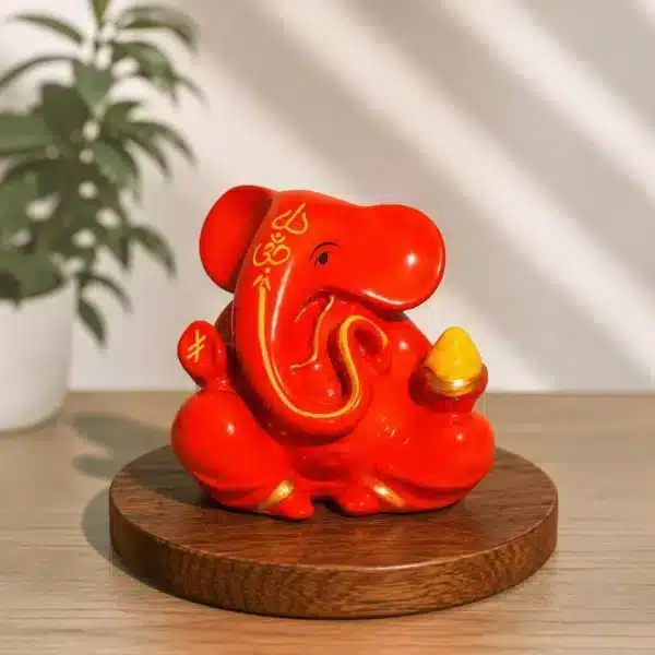 Orange Dashboard Ganesha Idol – Small Ganesh Ji for Car