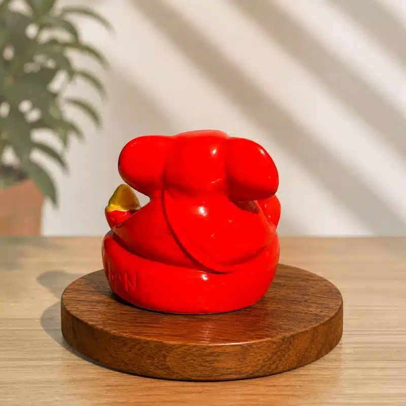 Orange Dashboard Ganesha Idol – Small Ganesh Ji for Car 3 Orange Dashboard Ganesha Idol